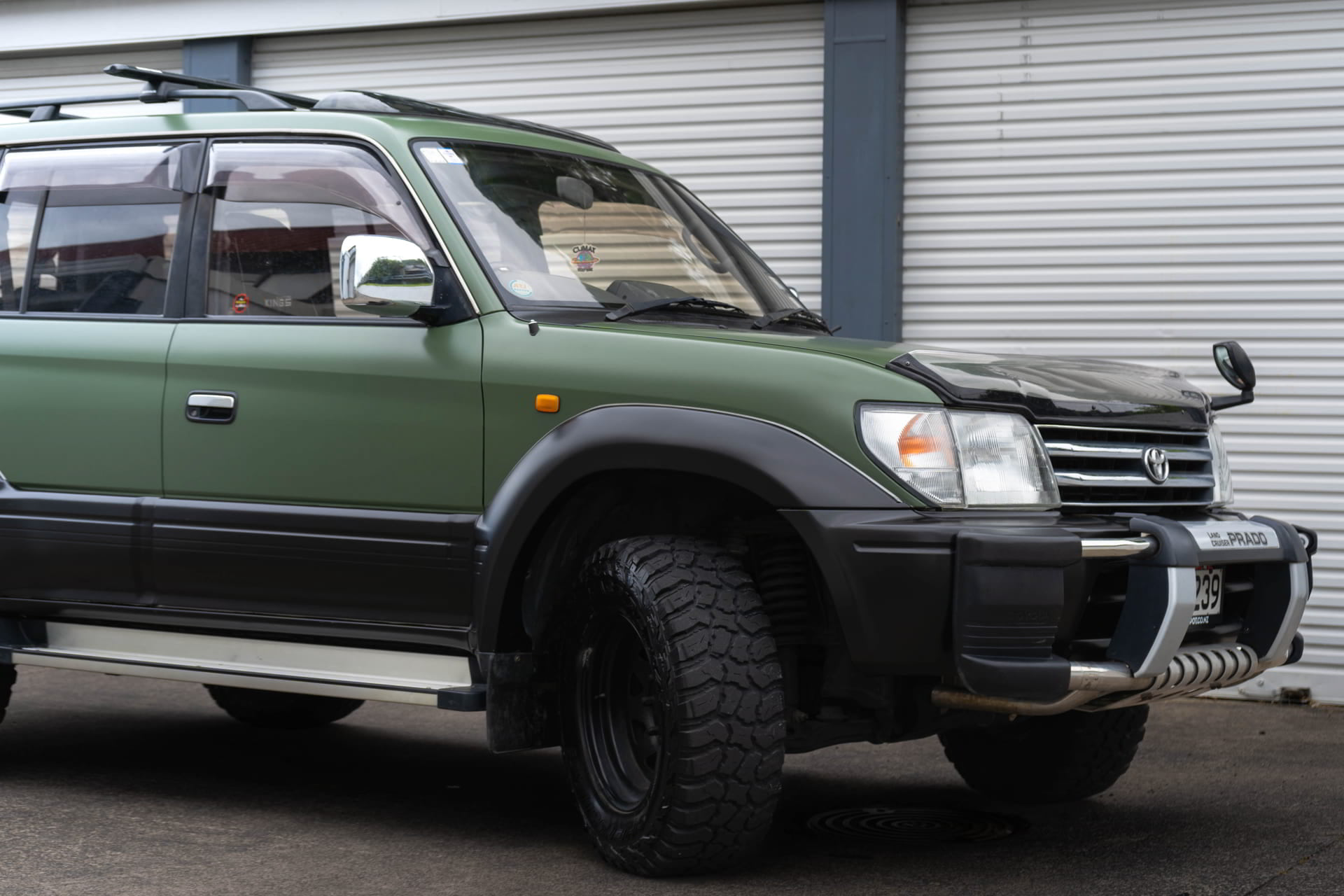 dark green suv side paint protection film studio finish rosedale auckland nz